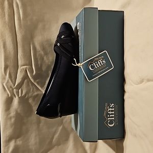 Navy wedge heels size 7.5